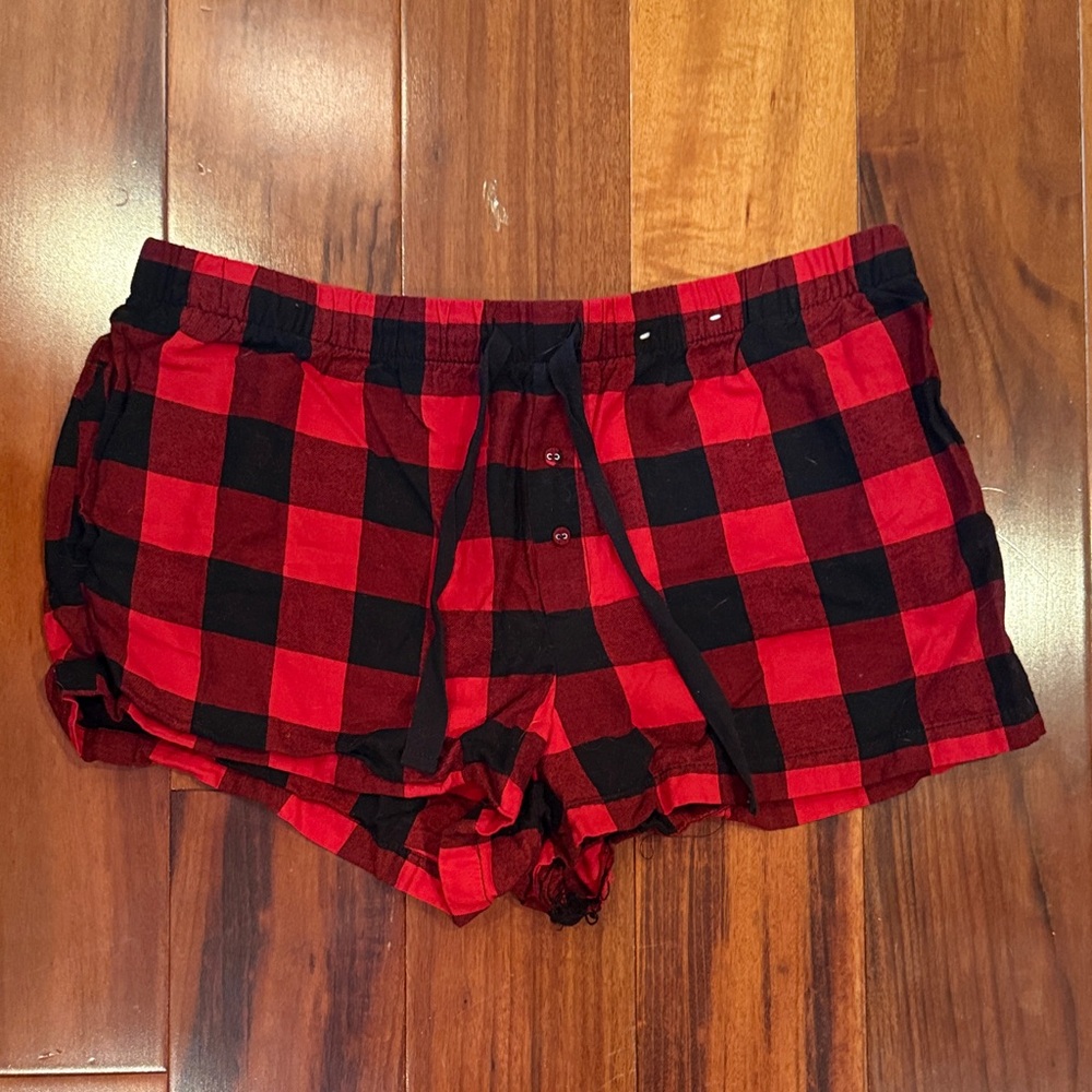 stars above Red and Black Plaid Lounge Shorts